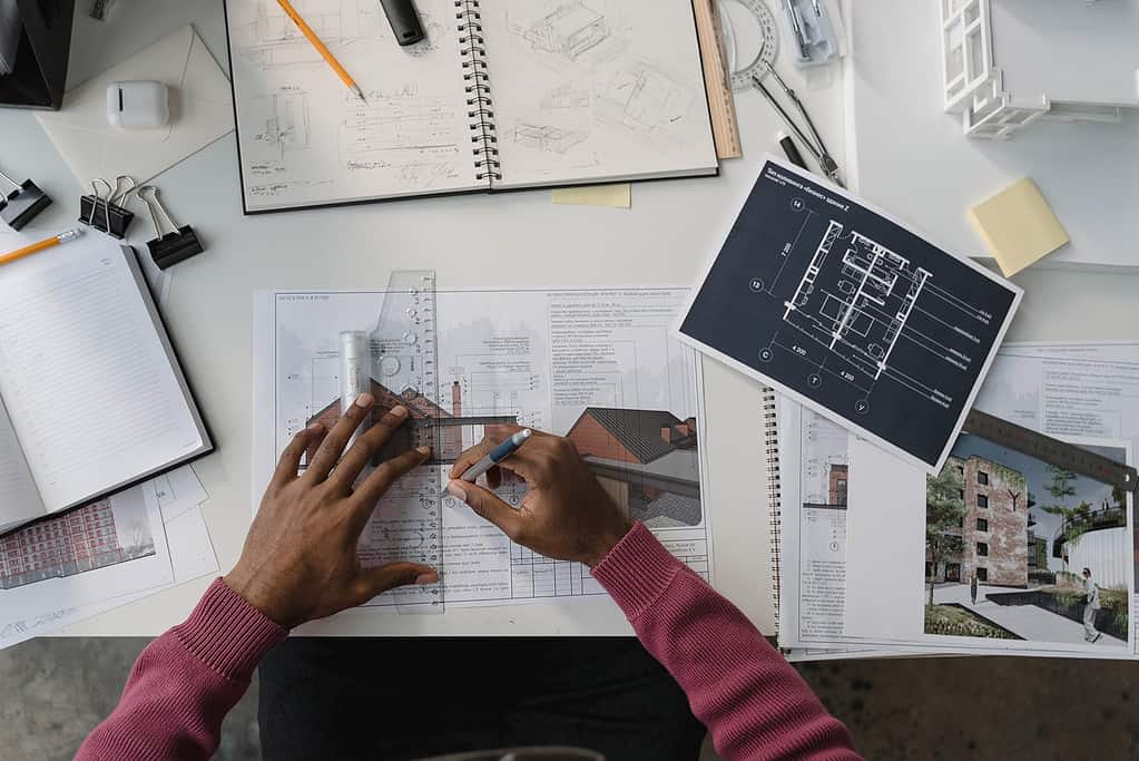 Architect working at computer with design software